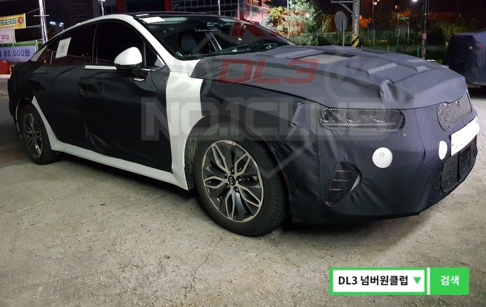 These could be the first spy photos of the Kia Optima Hybrid